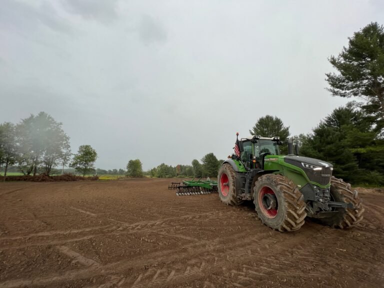 land clearing tractor in empty plot of land