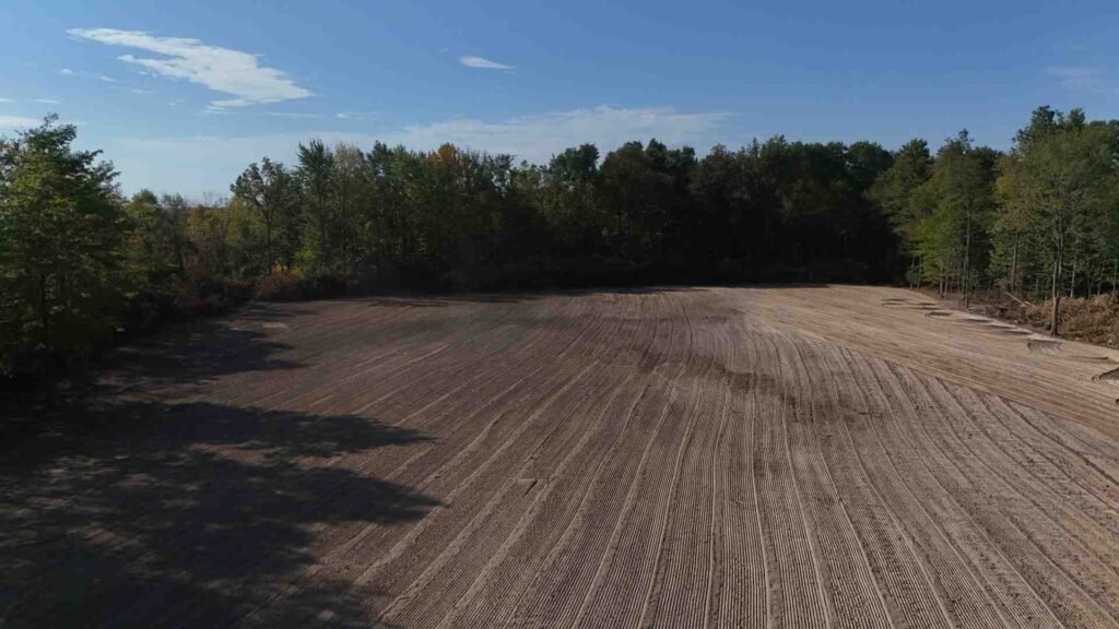 cost to clear and level 1 acre of land
